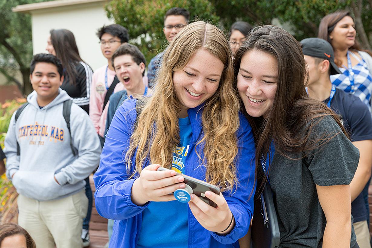 Students looking at their phone